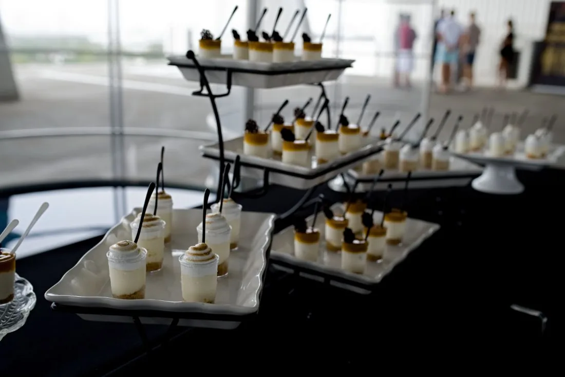 Tiered dessert display on a catering table at Scaling With Systems LIVE in Miami