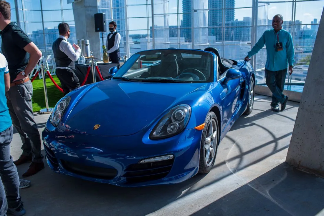 Blue convertible sports car on display in the venue at Scaling With Systems LIVE in Miami